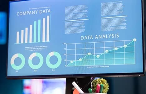 Financial data visualizations on a monitor